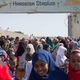 Muslim worshippers take pictures with their mobile phones after attending Eid al-Fitr prayers at the Hargeisa stadium in Hargeisa, the capital of the self-declared republic of Somaliland in northern Somalia, on June 4, 2019.